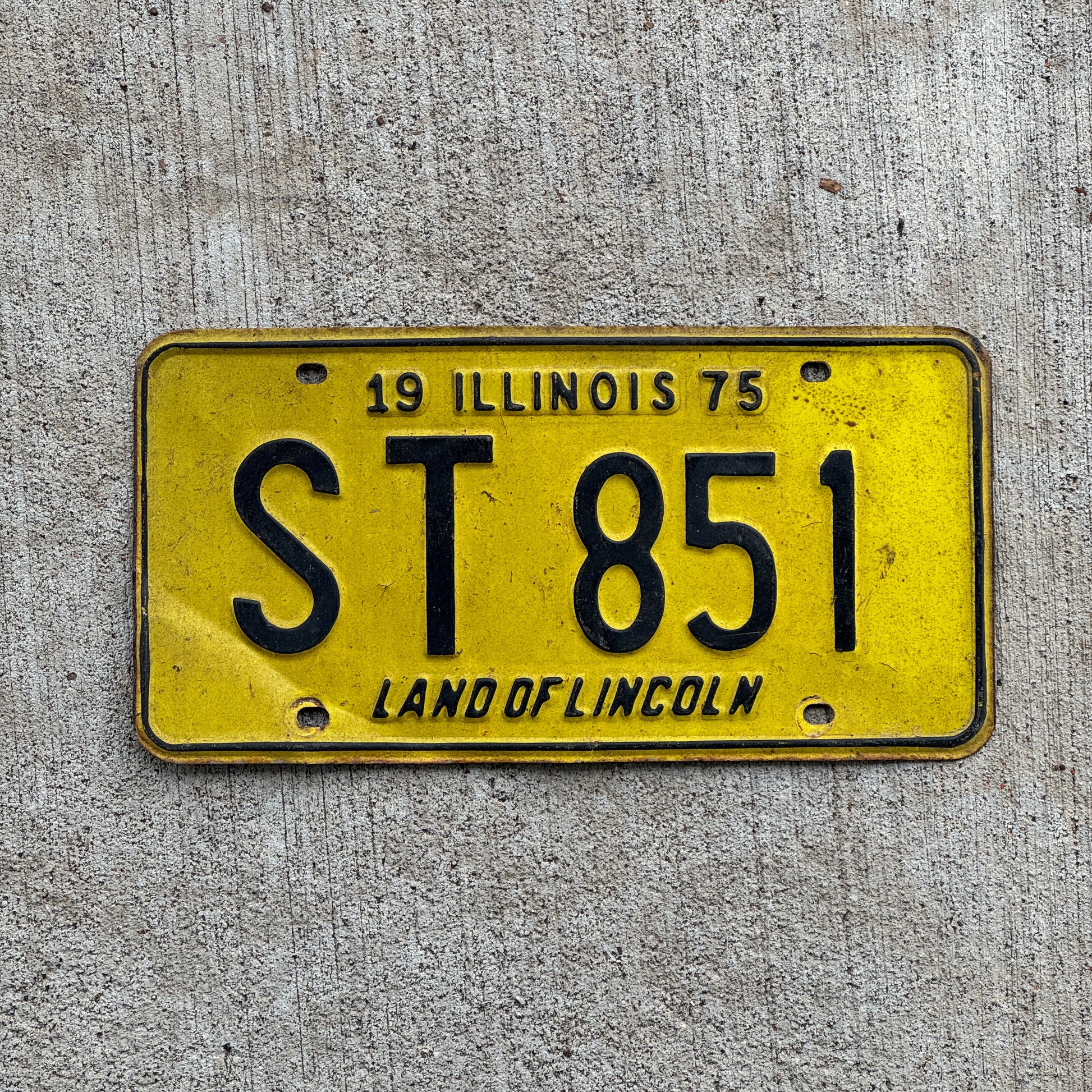 Photo of a 1975 Illinois License Plate Auto Tag 2 Vintage Garage ST 851 with original patina