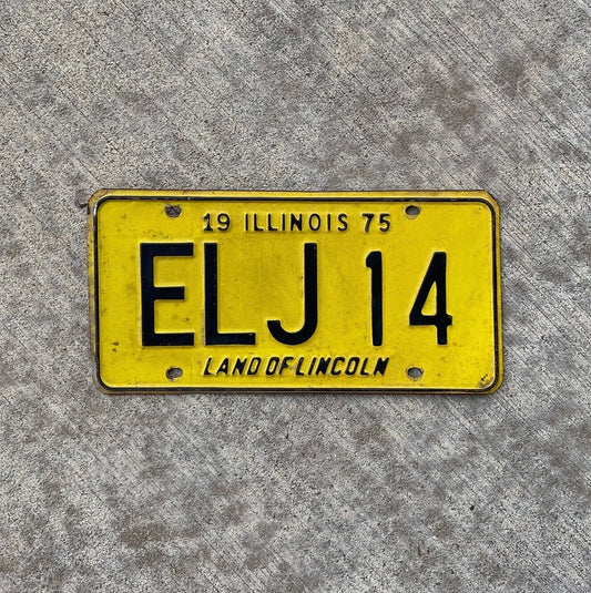 Photo of a 1975 Illinois License Plate Auto Tag Garage Decor Vintage ELJ 14 with original patina