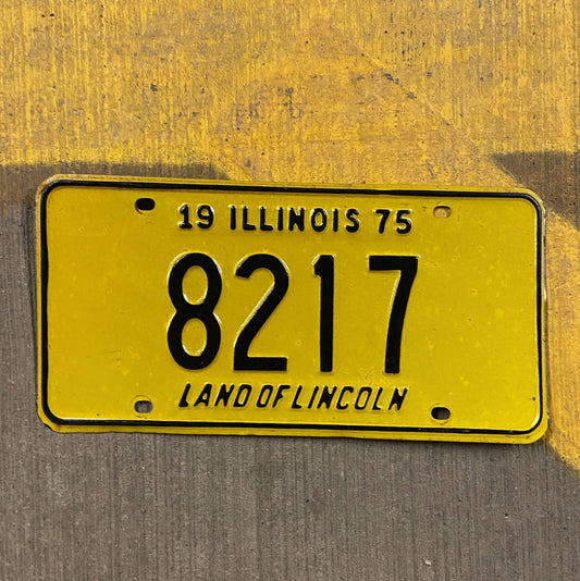 Photo of a 1975 Illinois License Plate Auto Tag Garage Decor Vintage Low Number Four Digit 8217 with original patina