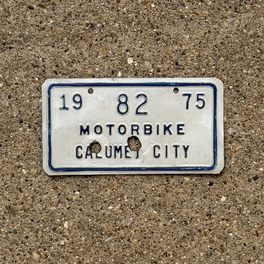 Photo of a 1975 Illinois Motorcycle Tax Tag Auto Tag Garage Decor Vintage Calumet City 82