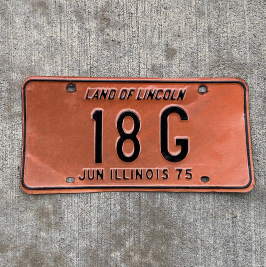 Photo of a 1975 Illinois Truck License Plate Auto Tag Garage Decor Vintage Low Number Two Digit 18 G with original patina