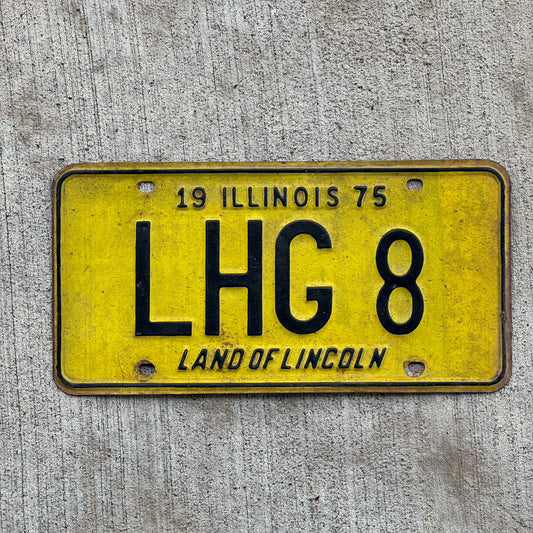 Photo of a 1975 Illinois Vanity License Plate Auto Tag 2 Vintage Garage LHG 8 with original patina