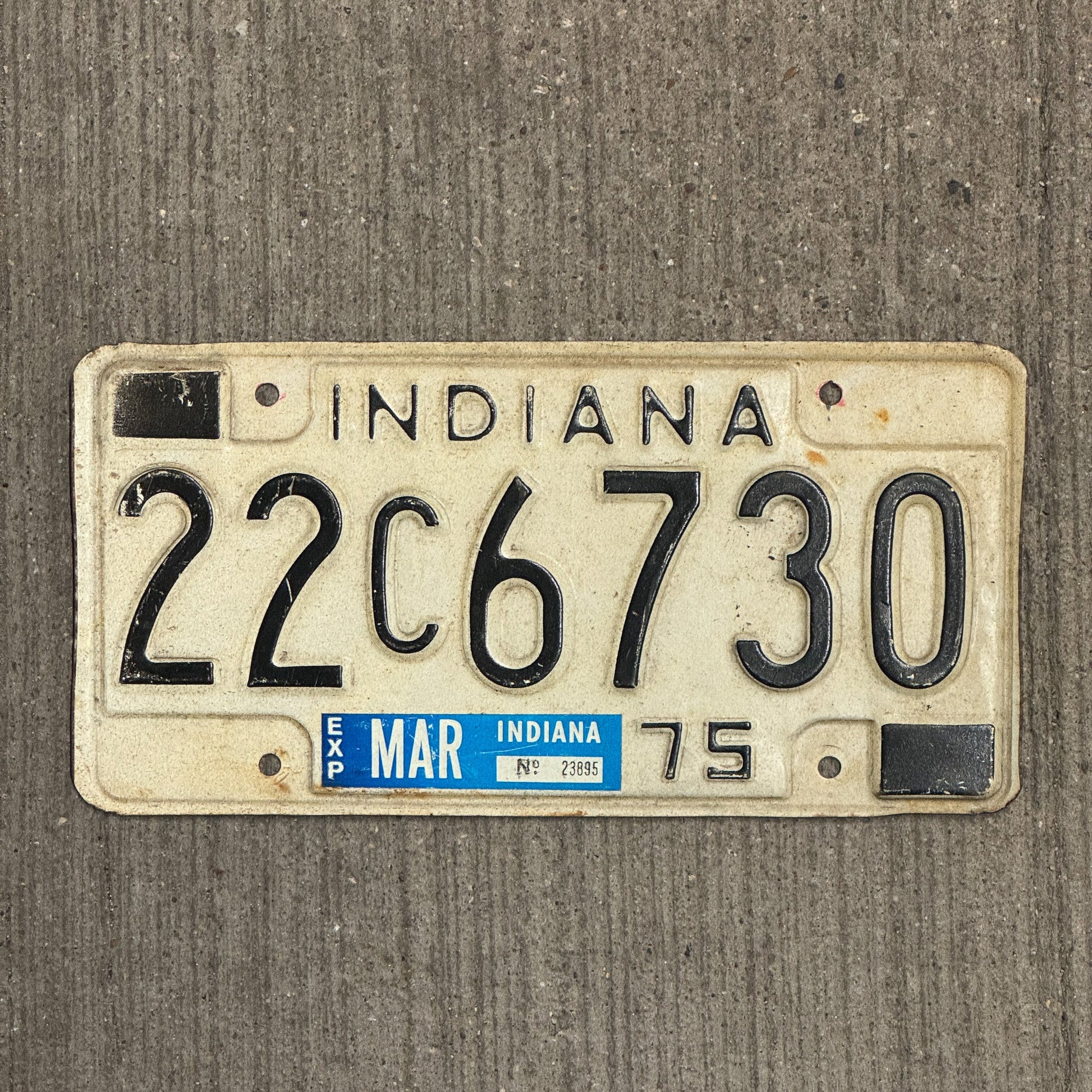 Photo of a 1975 Indiana License Plate Auto Tag Garage Decor Vintage 22 C 6730 with original patina