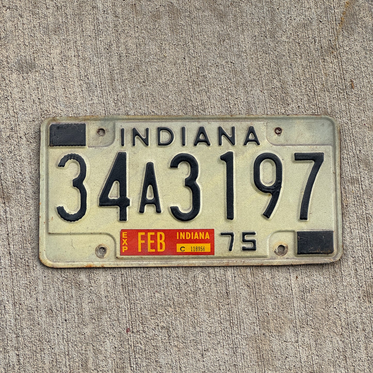 Photo of a 1975 Indiana License Plate Auto Tag Garage Decor Vintage 34 A 3197 with original patina