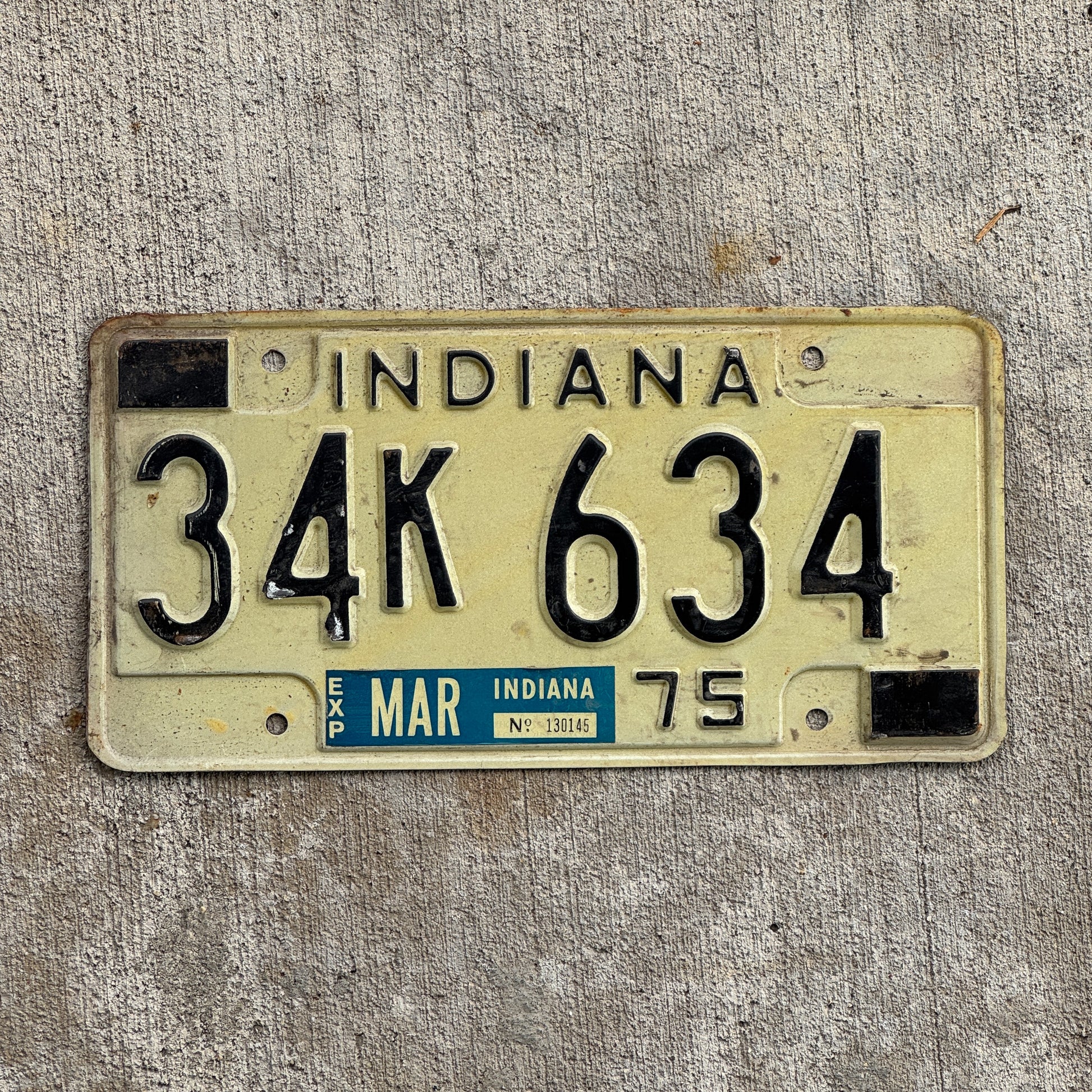 Photo of a 1975 Indiana License Plate Auto Tag Garage Decor Vintage 34 K 634 with original patina