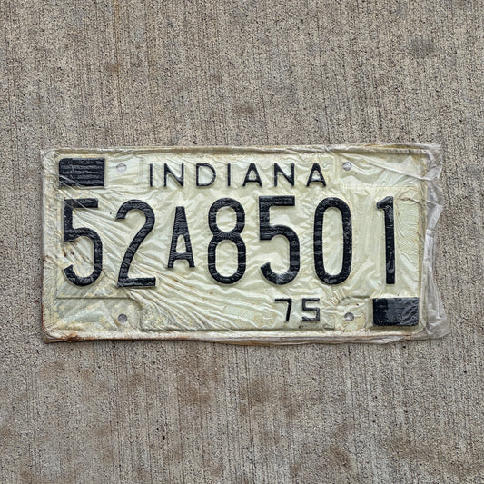Photo of a 1975 Indiana License Plate Auto Tag Garage Decor Vintage New Old Stock 52 A 8501 with original patina