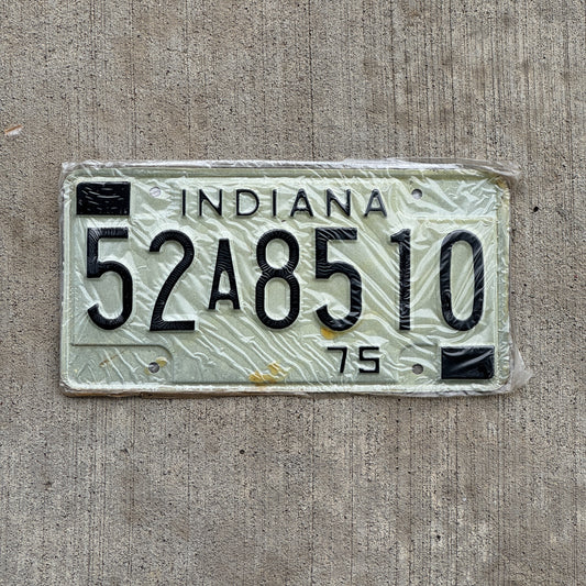 Photo of a 1975 Indiana License Plate Auto Tag Garage Decor Vintage New Old Stock 52 A 8510 with original patina