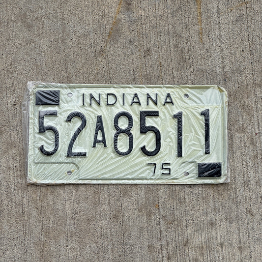 Photo of a 1975 Indiana License Plate Auto Tag Garage Decor Vintage New Old Stock 52 A 8511 with original patina