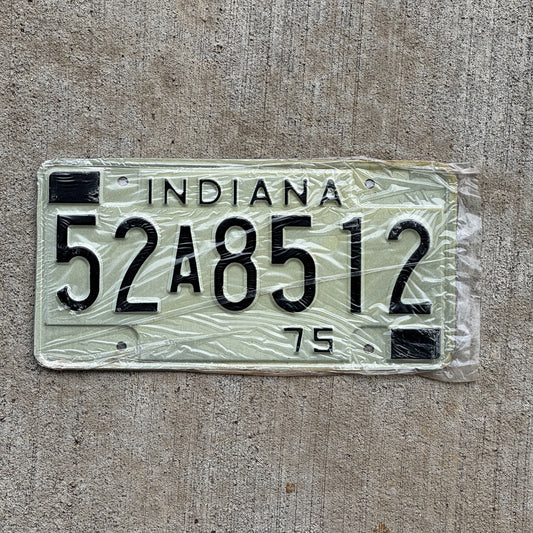 Photo of a 1975 Indiana License Plate Auto Tag Garage Decor Vintage New Old Stock 52 A 8512 with original patina