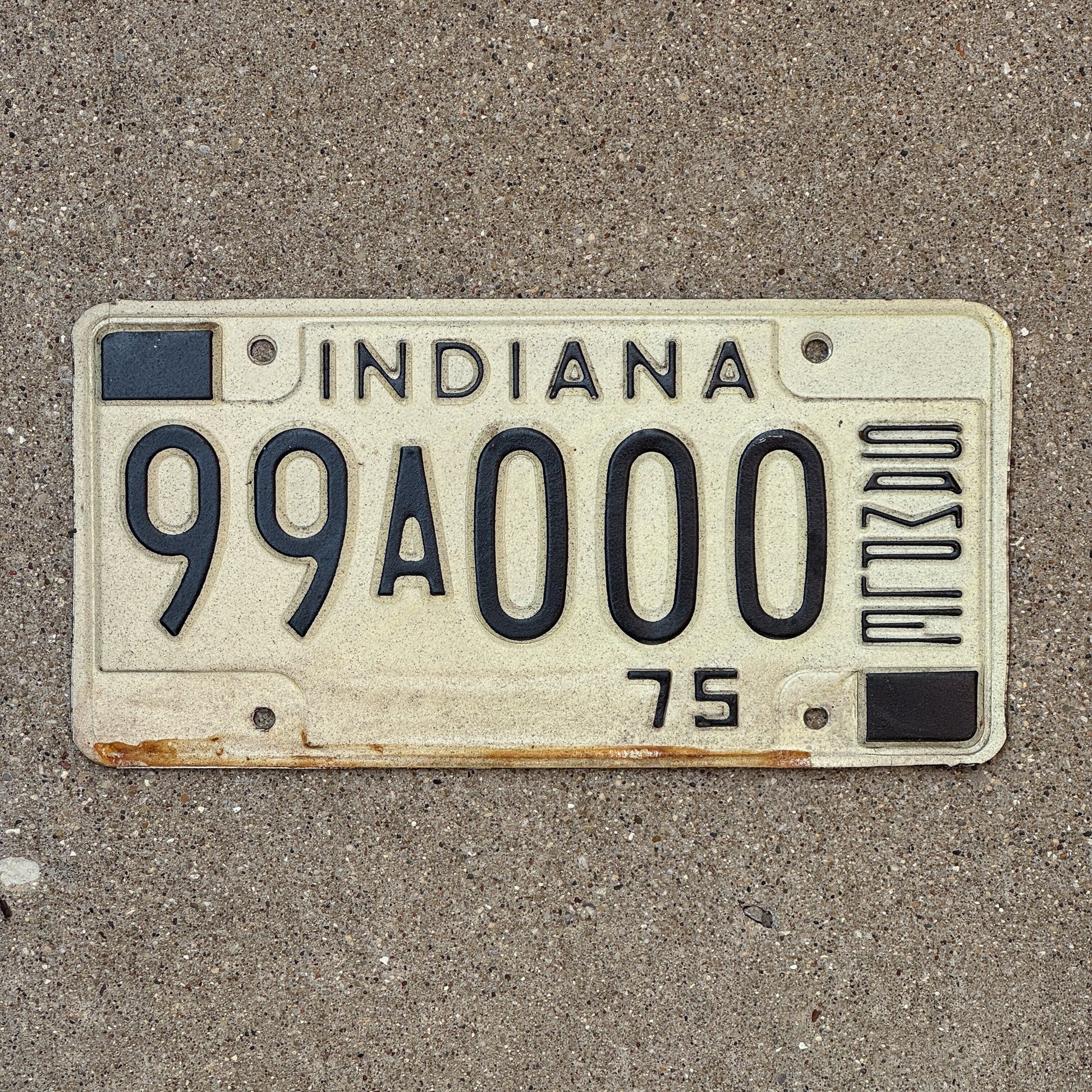 Photo of a 1975 Indiana Sample License Plate Auto Tag 1 Garage Decor 99A000 with original patina