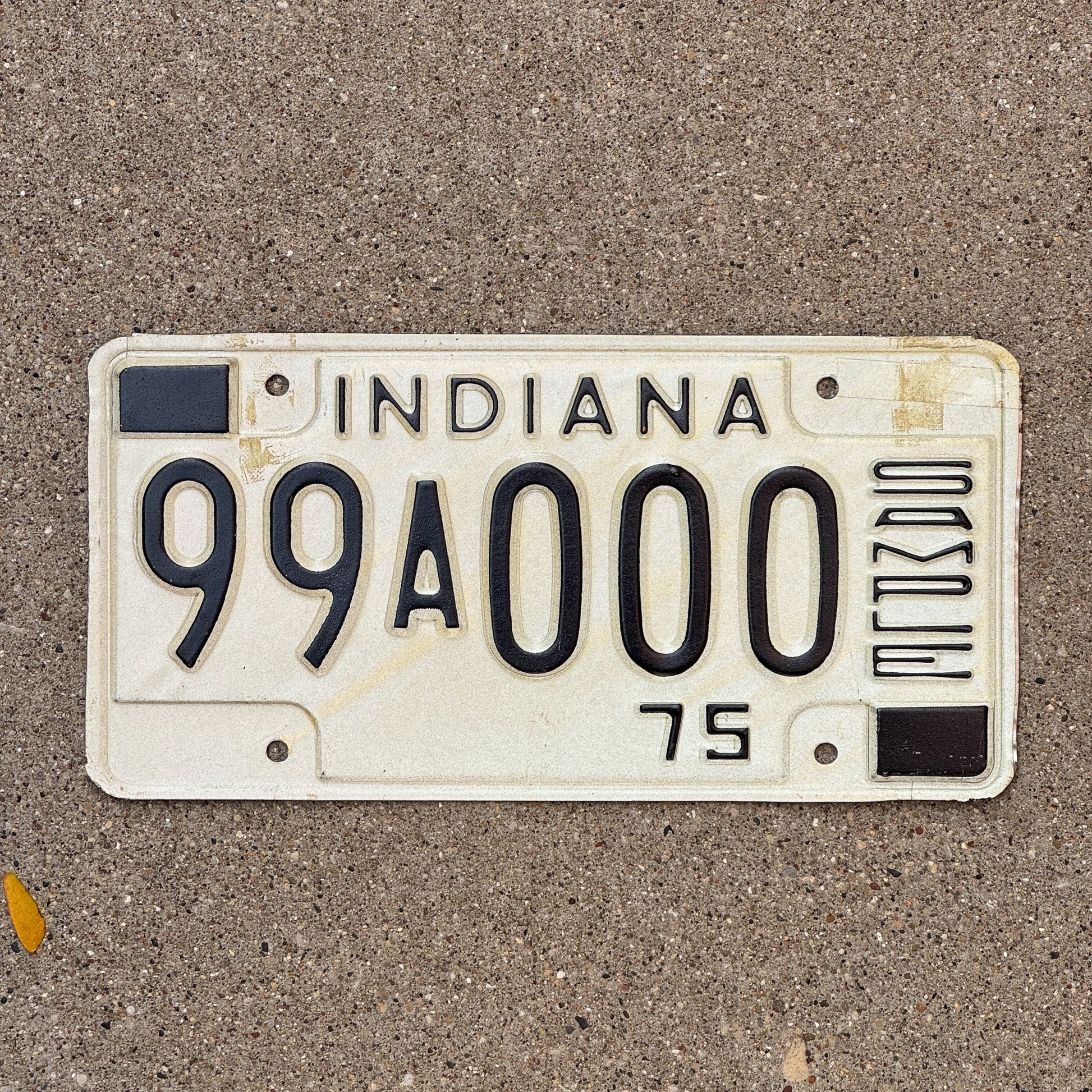 Photo of a 1975 Indiana Sample License Plate Auto Tag 2 Garage Decor 99A000 with original patina
