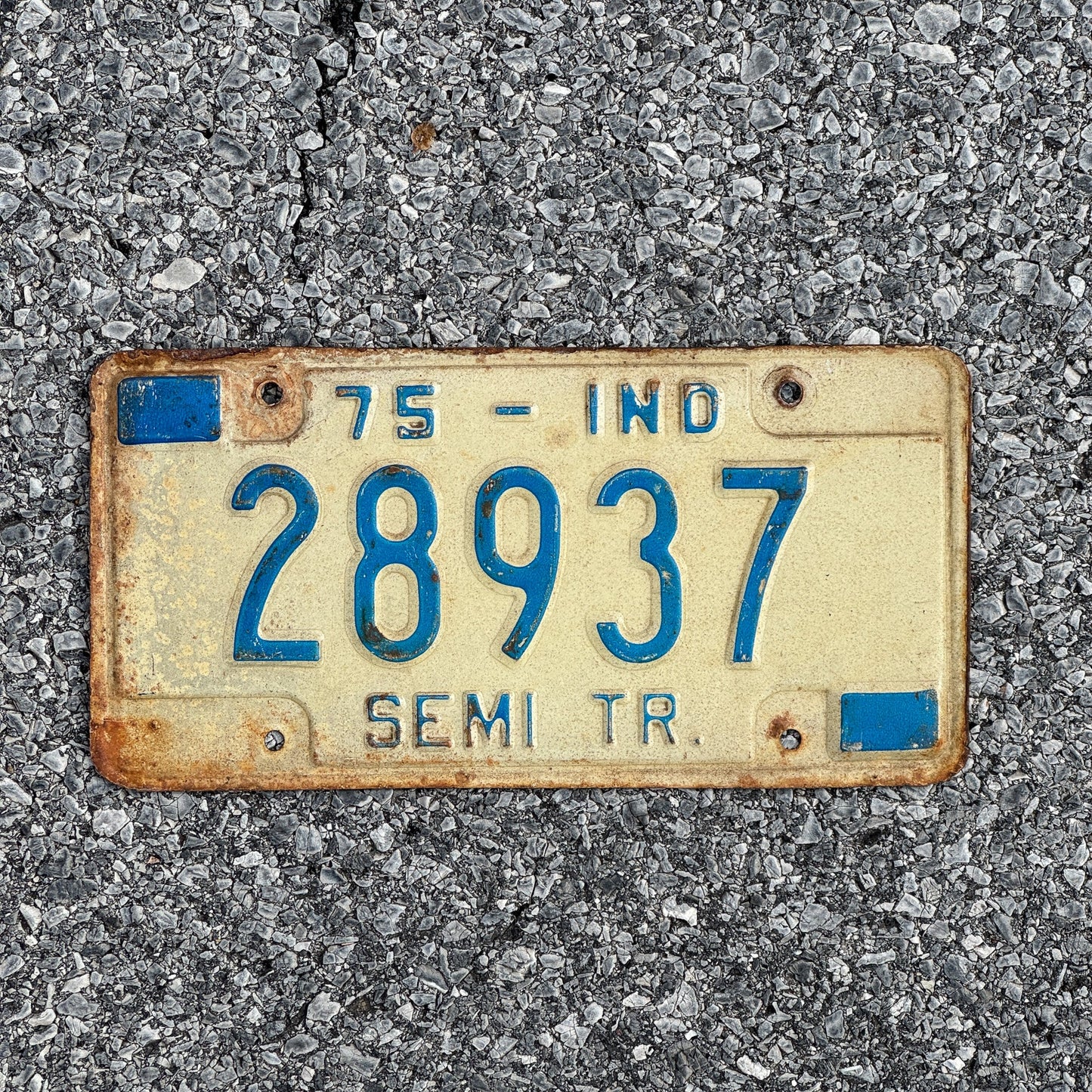 Photo of a 1975 Indiana Semi Trailer License Plate Auto Tag Garage Decor Vintage 28937