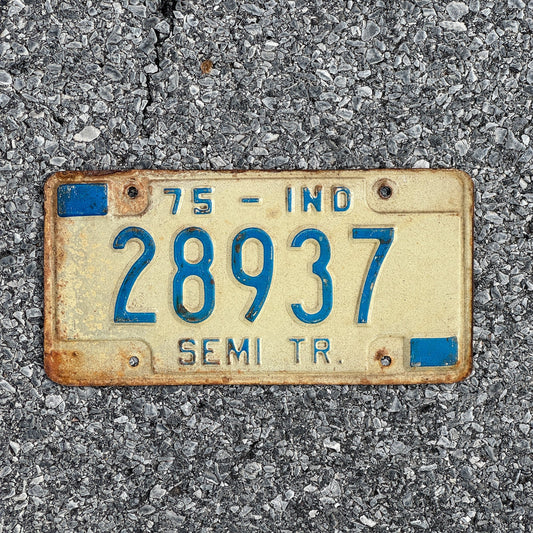 Photo of a 1975 Indiana Semi Trailer License Plate Auto Tag Garage Decor Vintage 28937