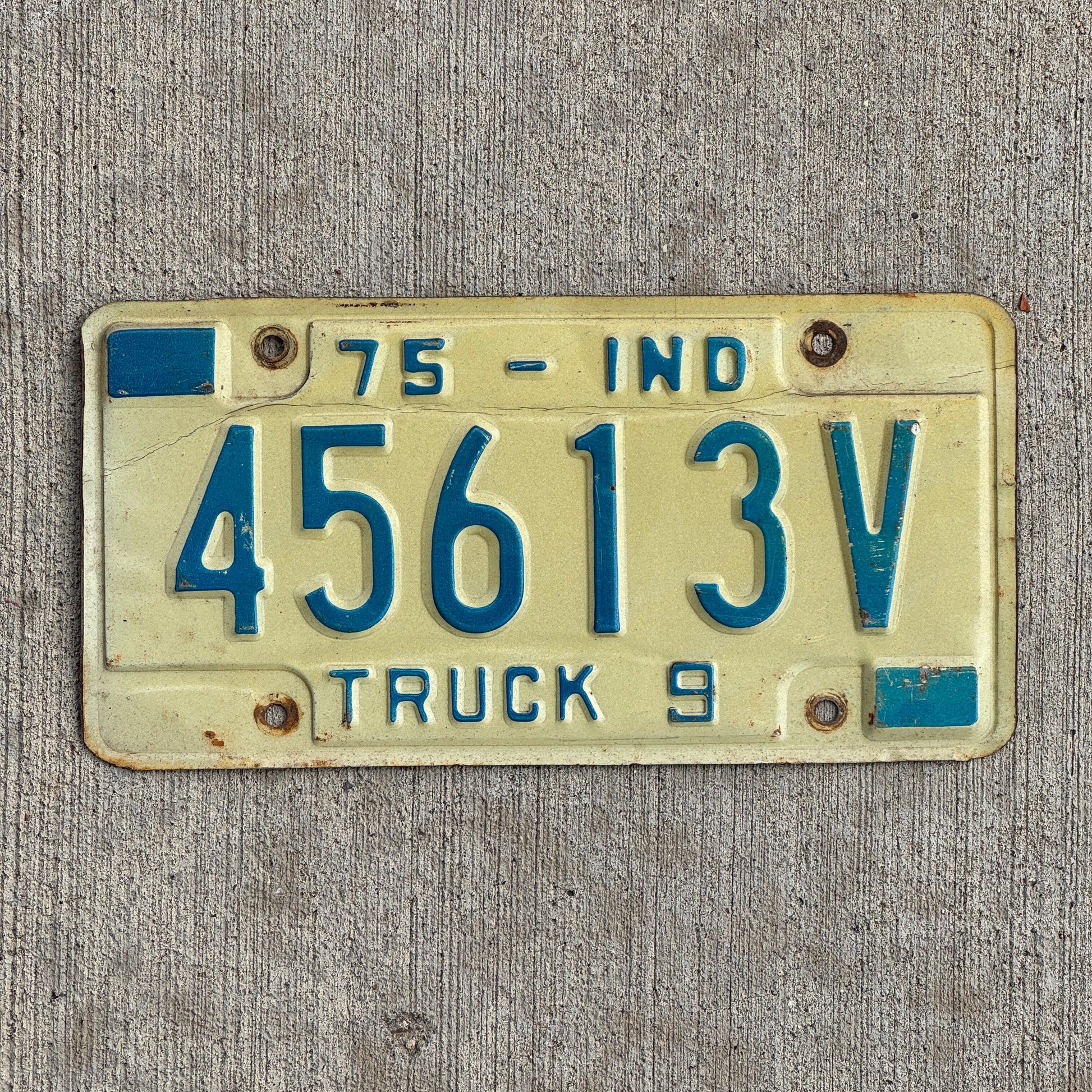 Photo of a 1975 Indiana Truck License Plate Auto Tag Garage Decor Vintage 45613 V with original patina