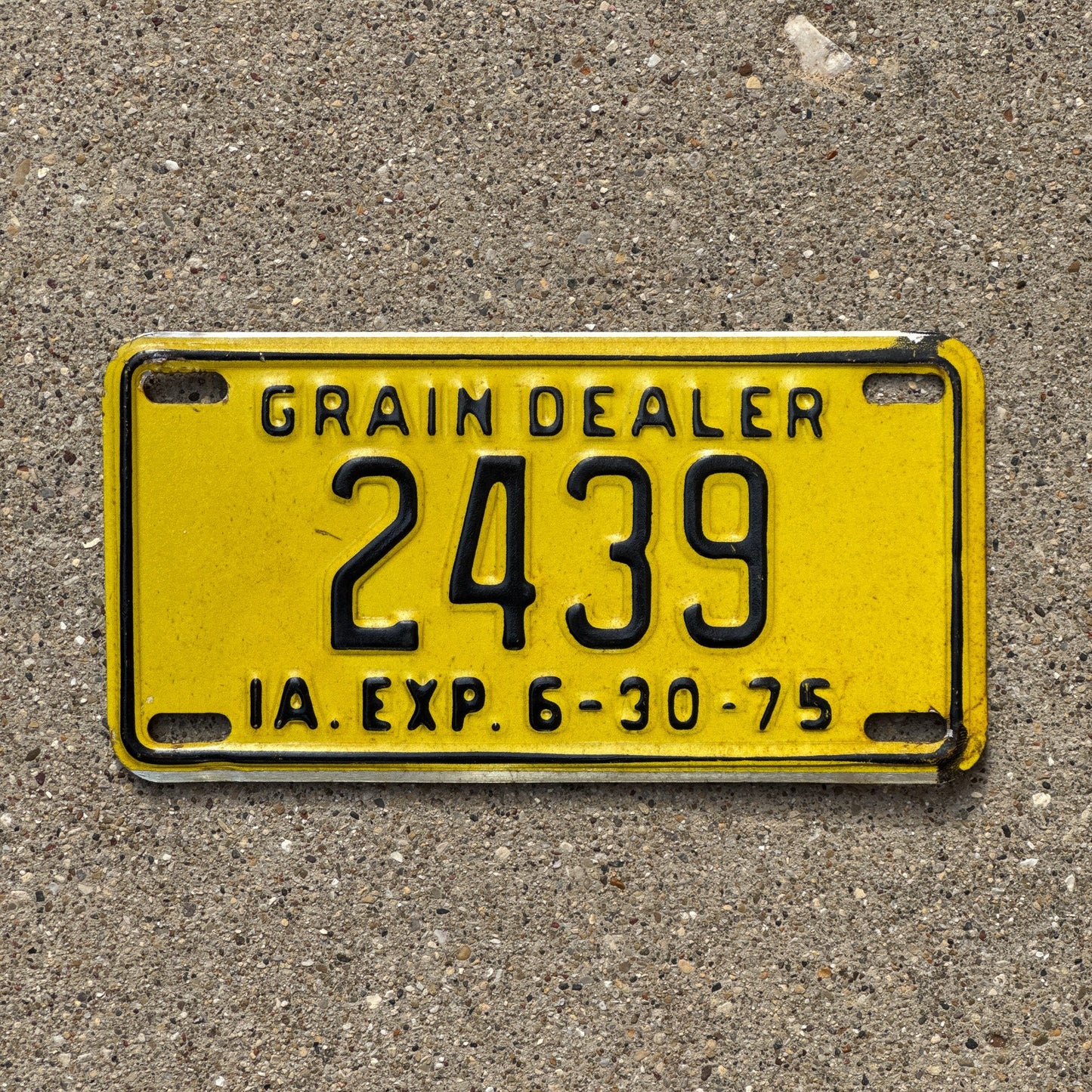 Photo of a 1975 Iowa Grain Dealer License Plate Auto Tag Garage Decor Vintage Small Size 2439