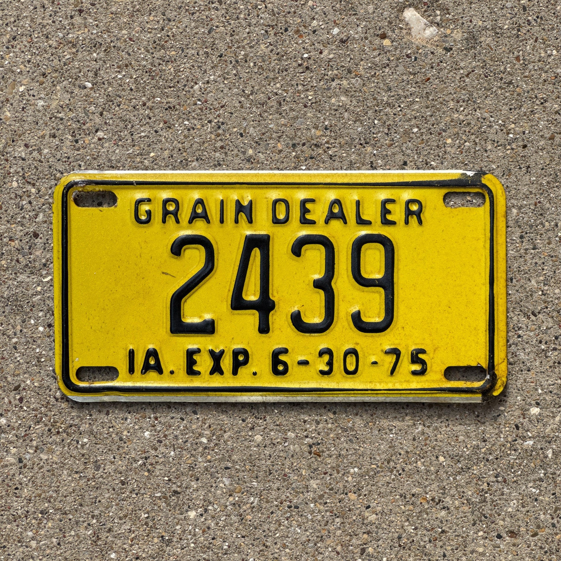 Photo of a 1975 Iowa Grain Dealer License Plate Auto Tag Garage Decor Vintage Small Size 2439