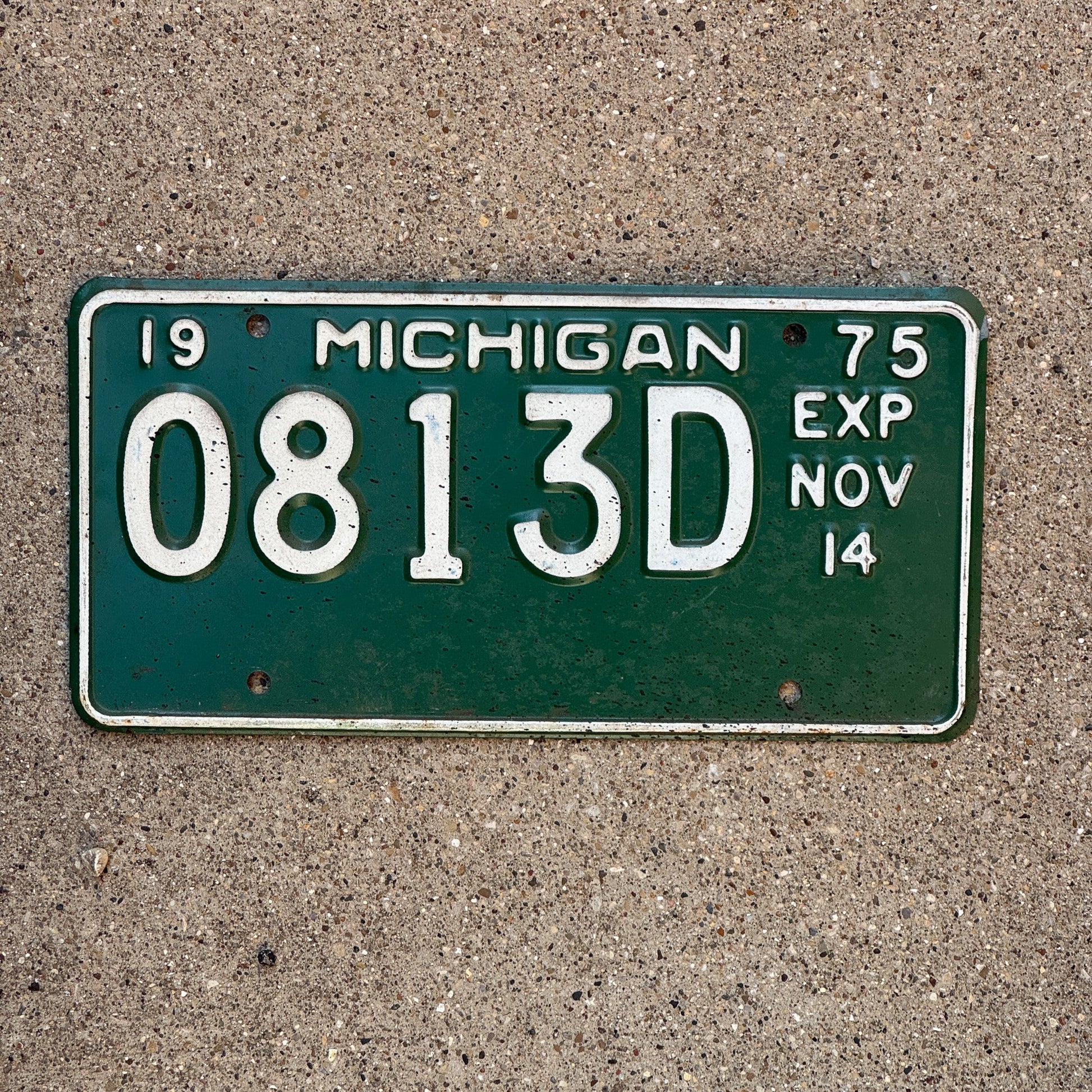 Photo of a 1975 Michigan Truck Half Year License Plate Auto Tag Garage Decor Vintage November 0813 D