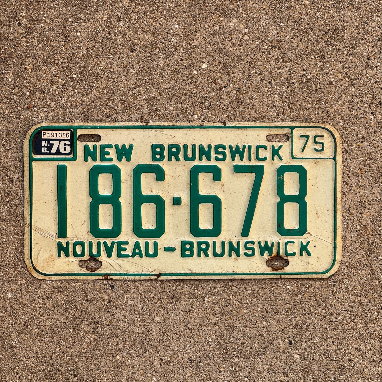 Photo of a 1975 New Brunswick License Plate Auto Tag Garage Decor Vintage 186 678