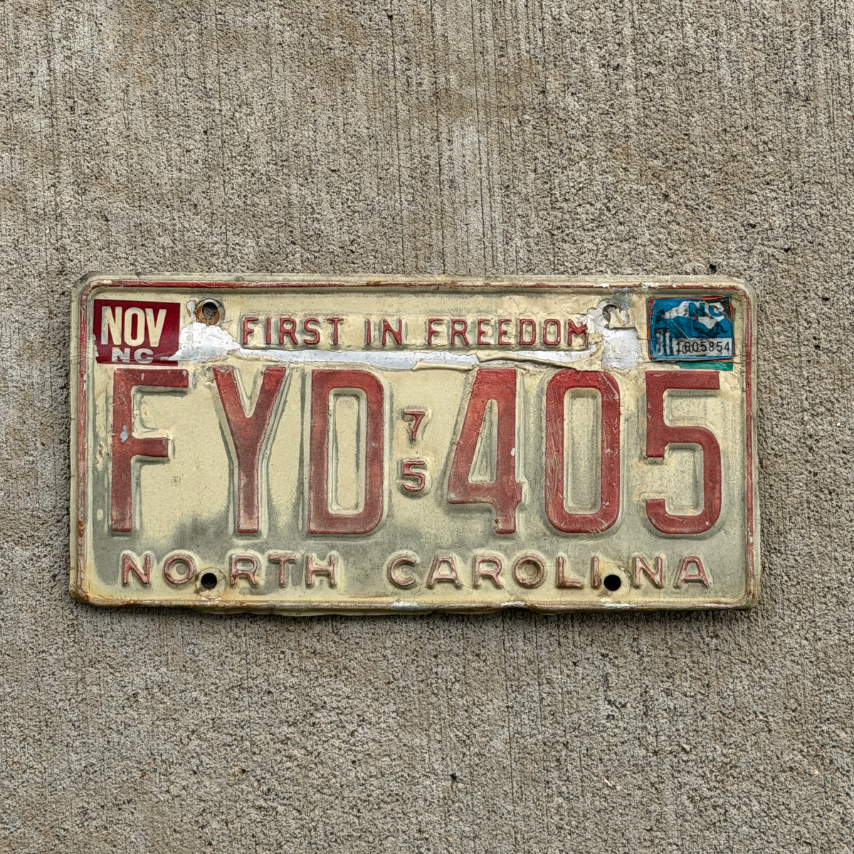 Photo of a 1975 North Carolina License Plate Auto Tag Garage Decor Vintage FYD 405 with original patina