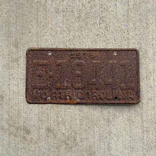 Photo of a 1975 North Carolina Trailer License Plate Auto Tag Garage Decor Vintage E 18441 with original patina