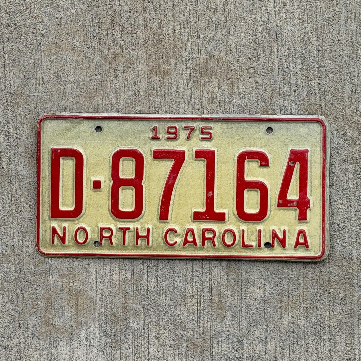 Photo of a 1975 North Carolina Trailer License Plate Auto Tag Garage Decor Vintage Private Trailer D 87164 with original patina