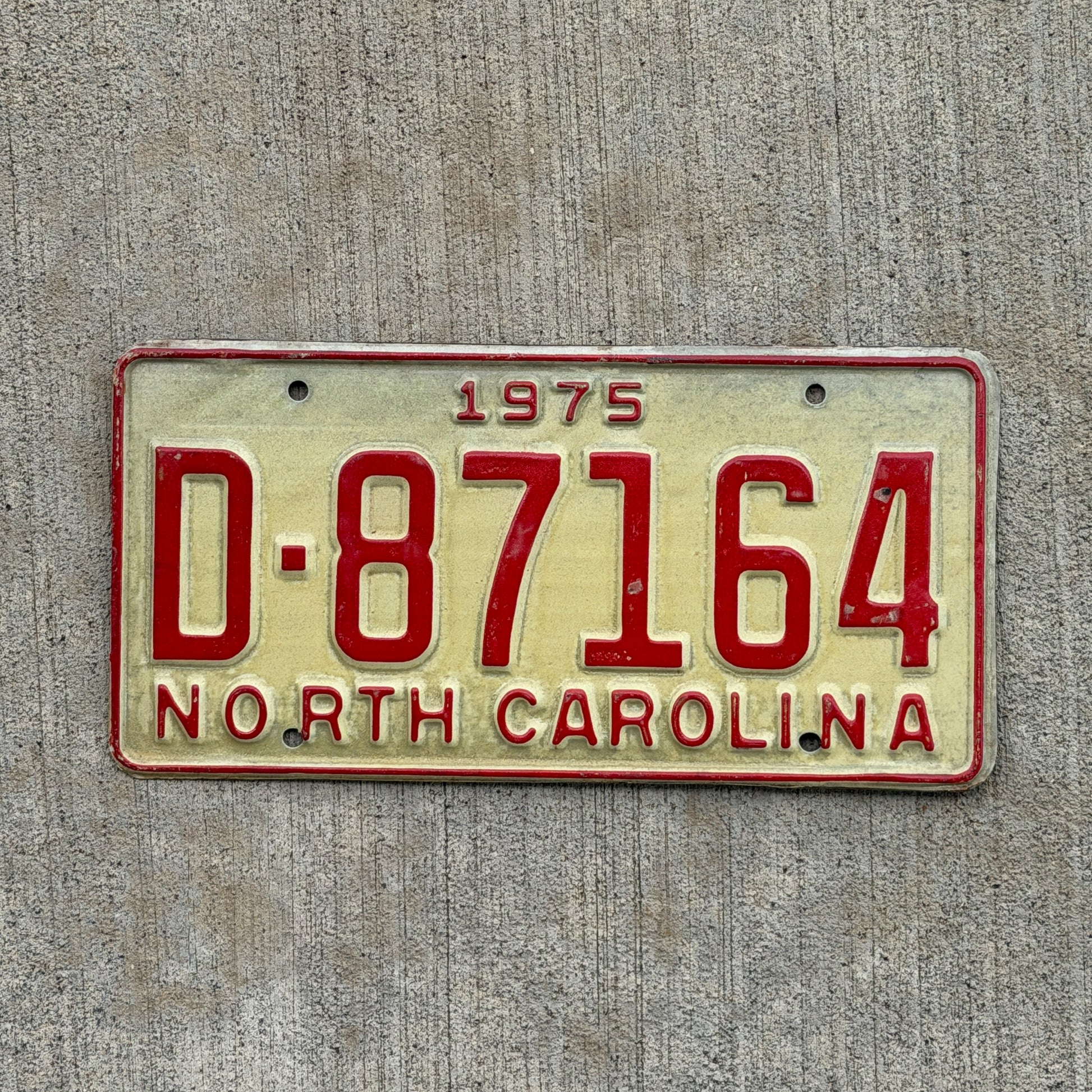 Photo of a 1975 North Carolina Trailer License Plate Auto Tag Garage Decor Vintage Private Trailer D 87164 with original patina