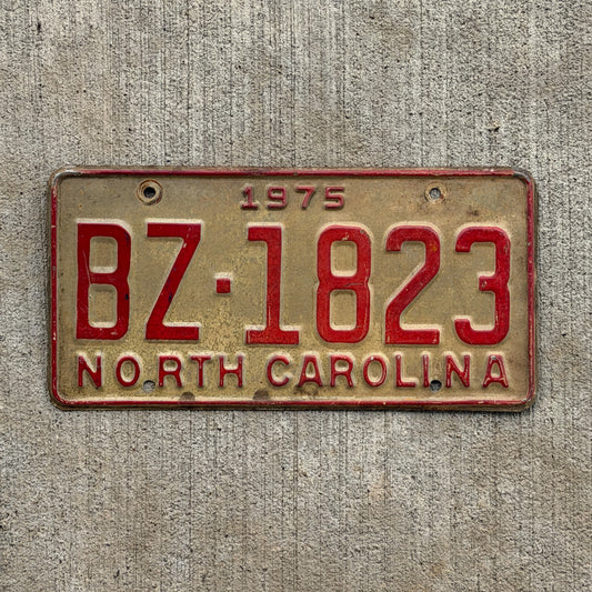 Photo of a 1975 North Carolina Truck License Plate Auto Tag Garage Decor Vintage BZ 1823 with original patina
