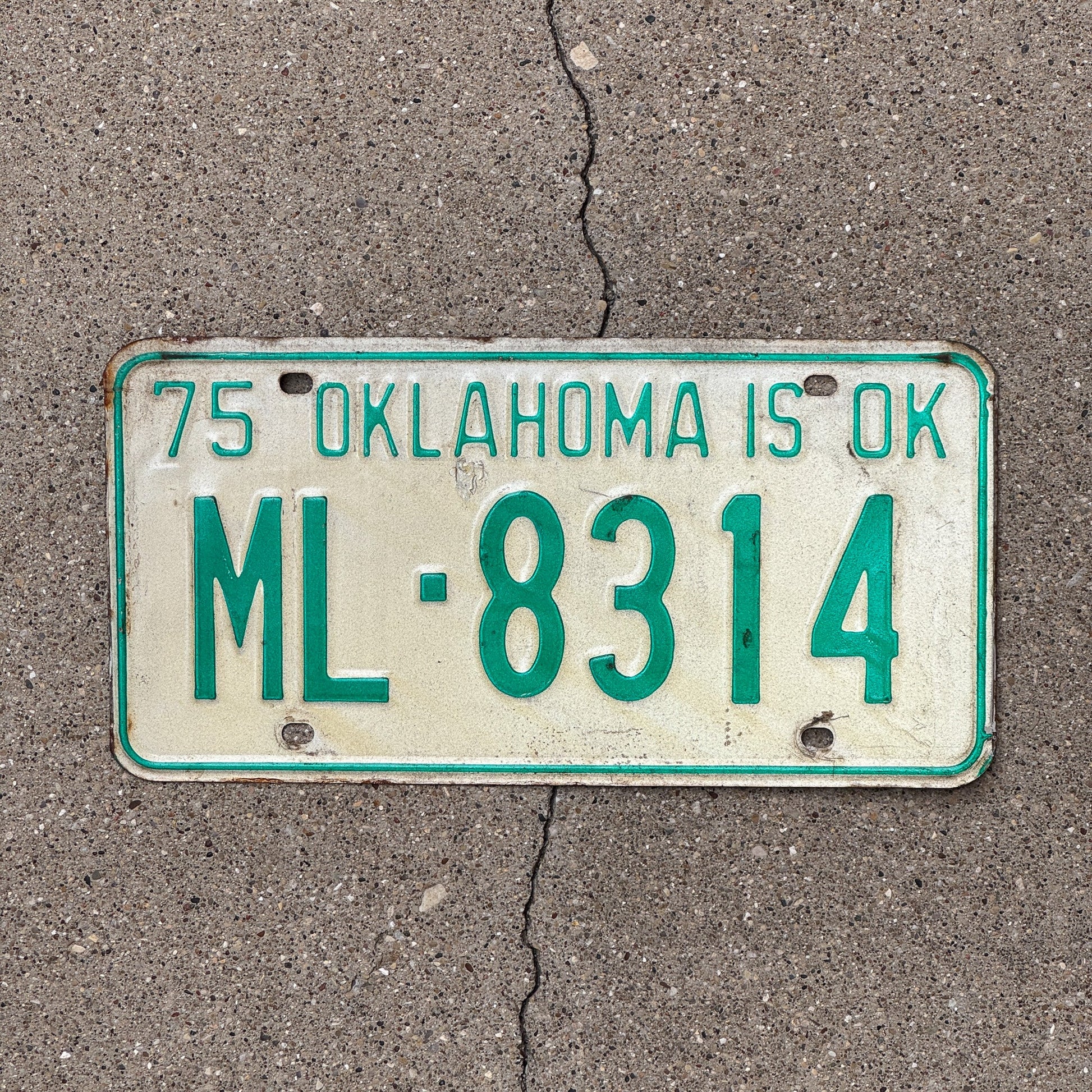 Photo of a 1975 Oklahoma License Plate Auto Tag Garage Decor Vintage ML 8314