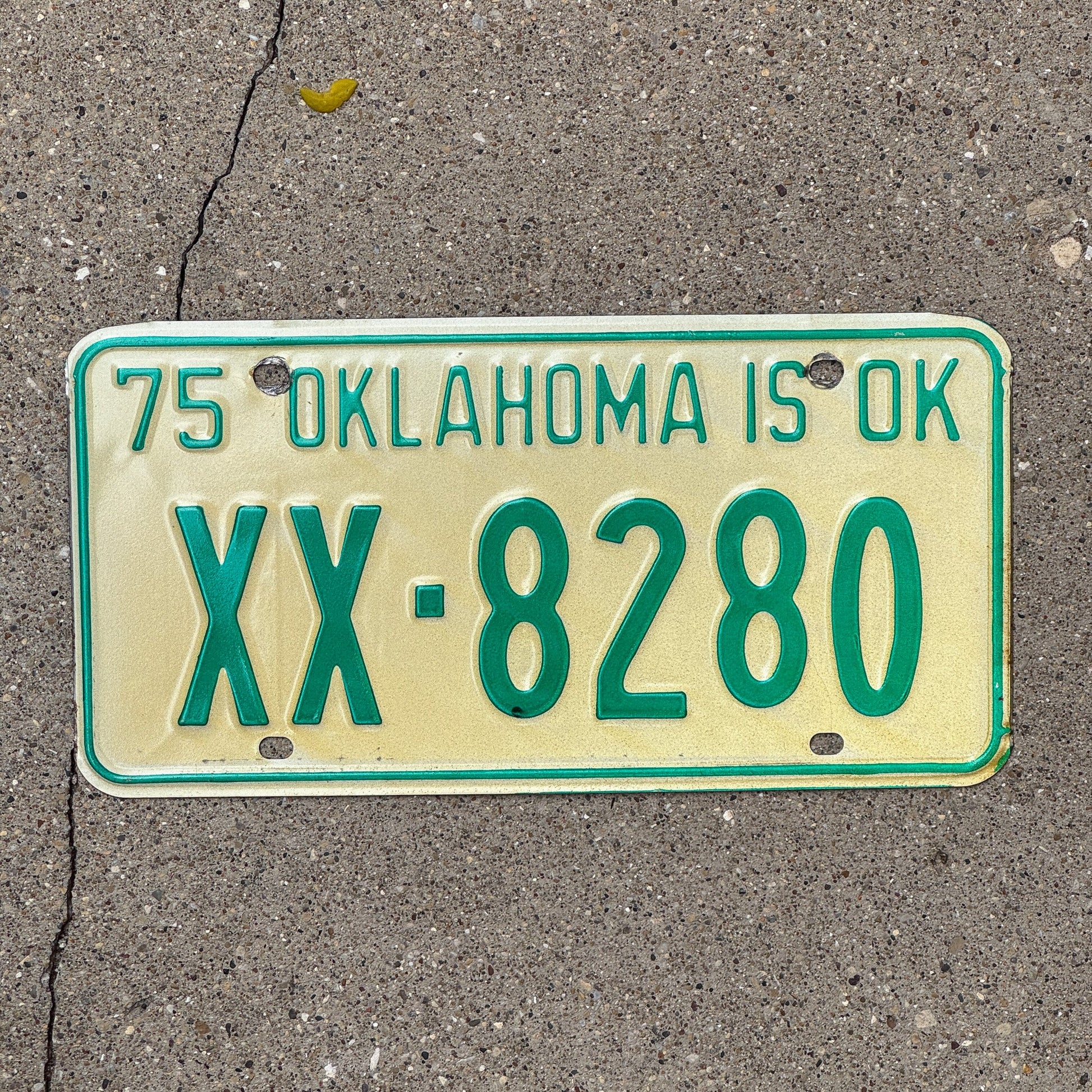 Photo of a 1975 Oklahoma License Plate Auto Tag Garage Decor Vintage XX 8280 with original patina