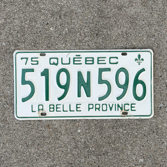Photo of a 1975 Quebec License Plate Auto Tag Garage Decor Vintage 519 N 596 with original patina