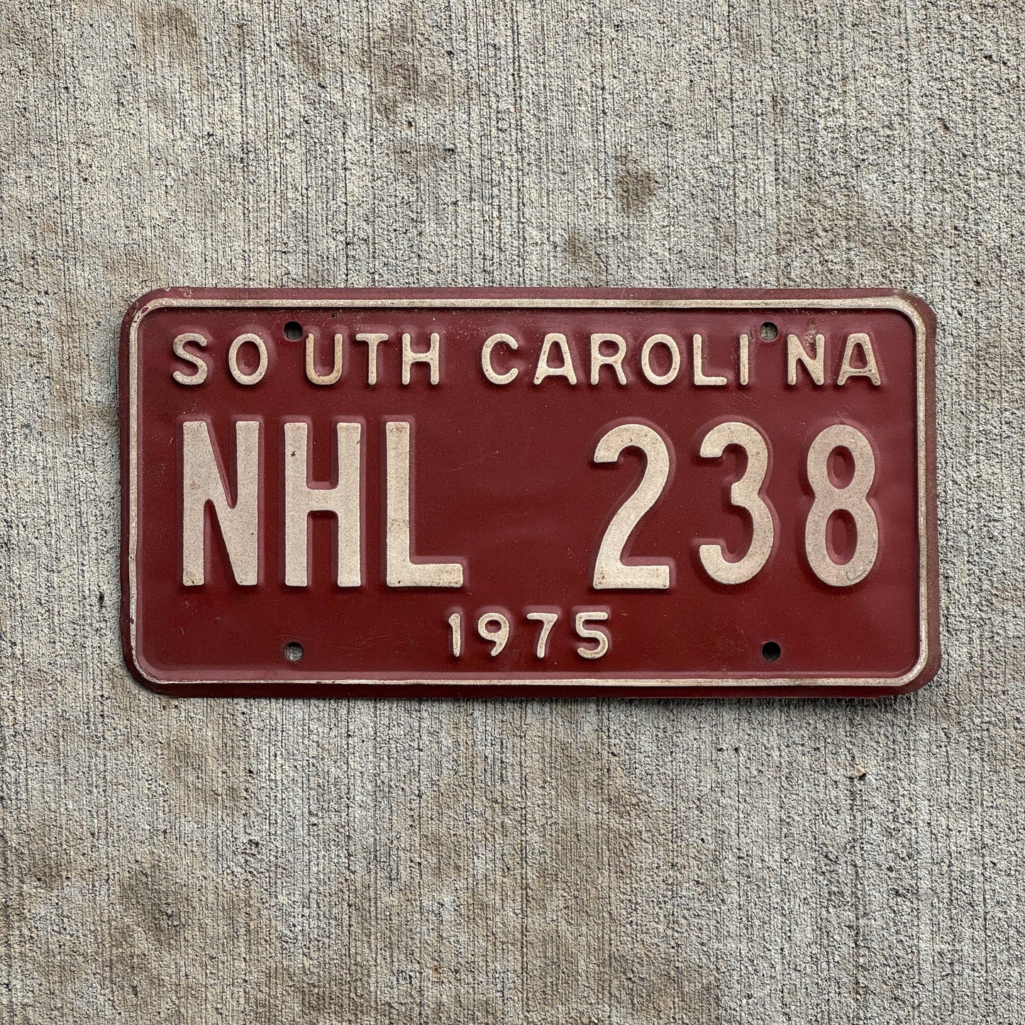 Photo of a 1975 South Carolina License Plate Auto Tag Garage Decor Vintage Hockey Fan Gift NHL 238 with original patina