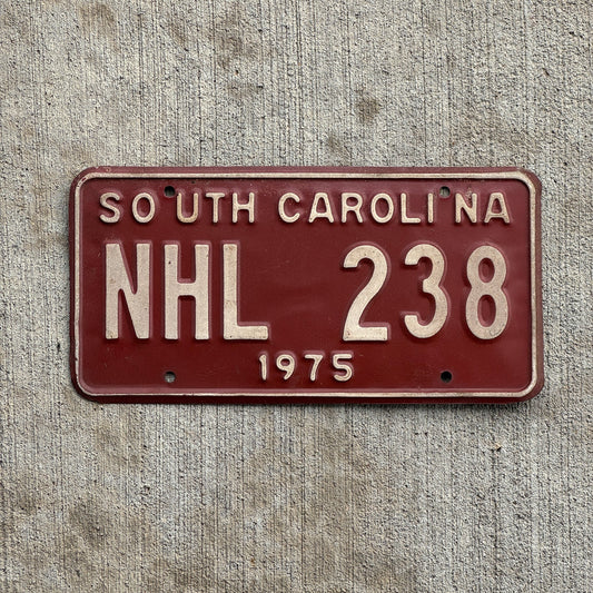 Photo of a 1975 South Carolina License Plate Auto Tag Garage Decor Vintage Hockey Fan Gift NHL 238 with original patina