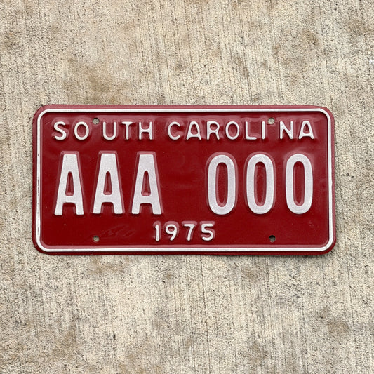 Photo of a 1975 South Carolina Sample License Plate Auto Tag Garage Decor Vintage AAA 000 with original patina