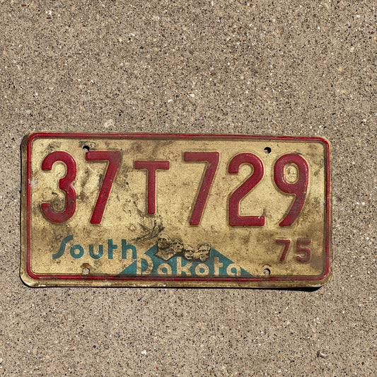 Photo of a 1975 South Dakota Truck License Plate Auto Tag Garage Decor Vintage Hutchinson 37 T 729