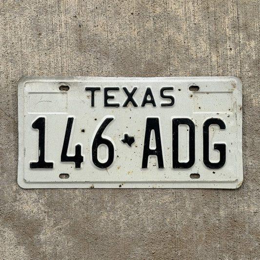 Photo of a 1975 Texas License Plate Auto Tag Garage Decor Vintage 146 ADG with original patina