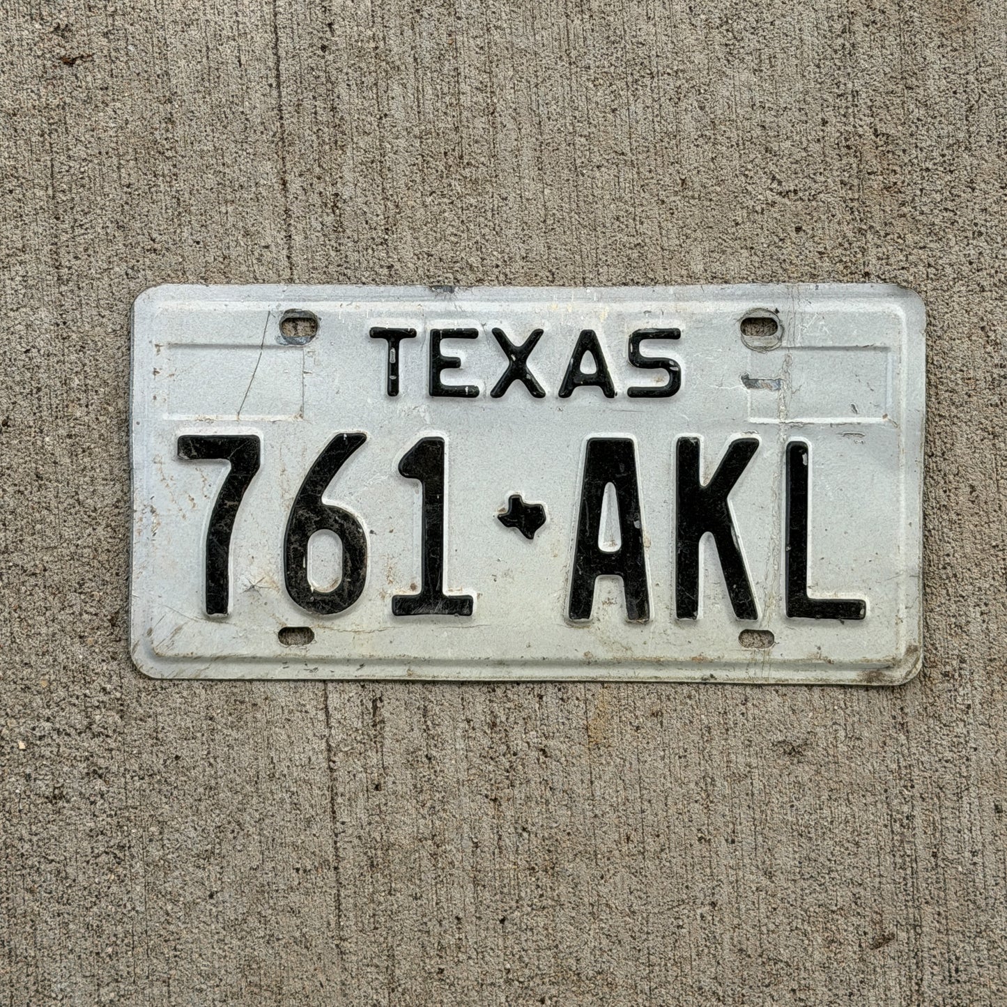 Photo of a 1975 Texas License Plate Auto Tag Garage Decor Vintage 761 AKL with original patina