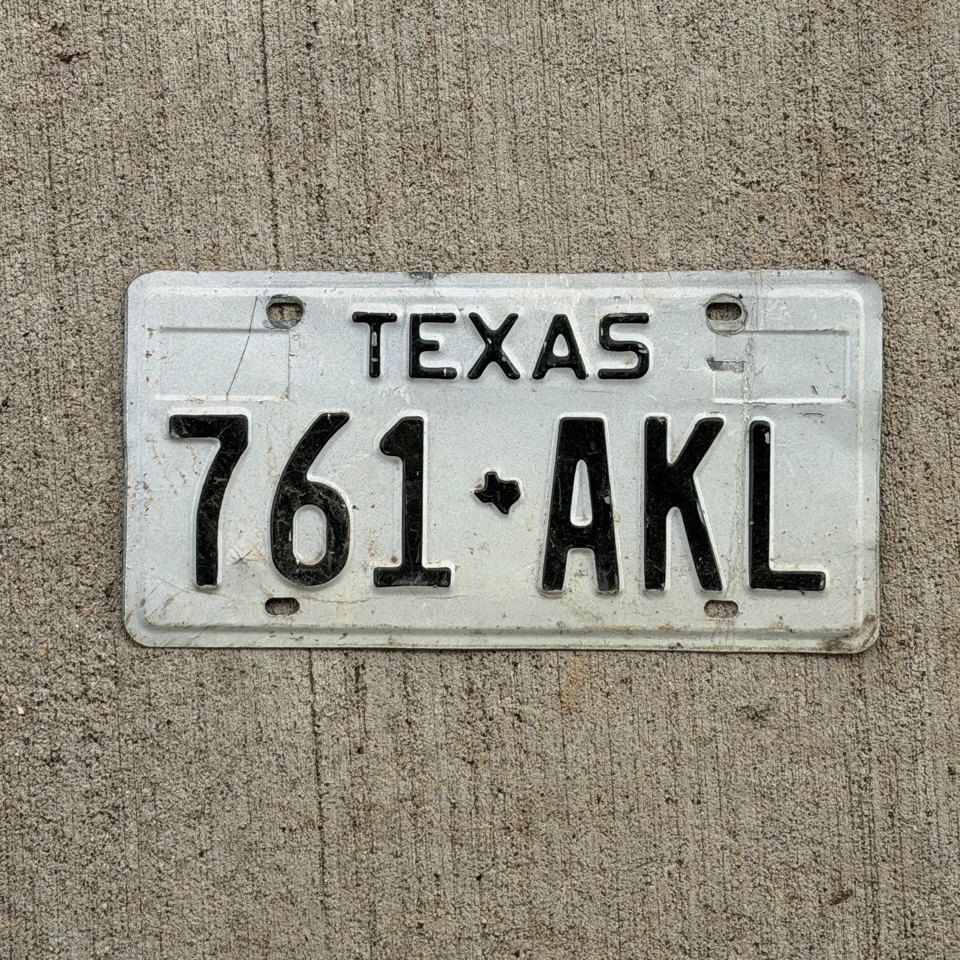Photo of a 1975 Texas License Plate Auto Tag Garage Decor Vintage 761 AKL with original patina