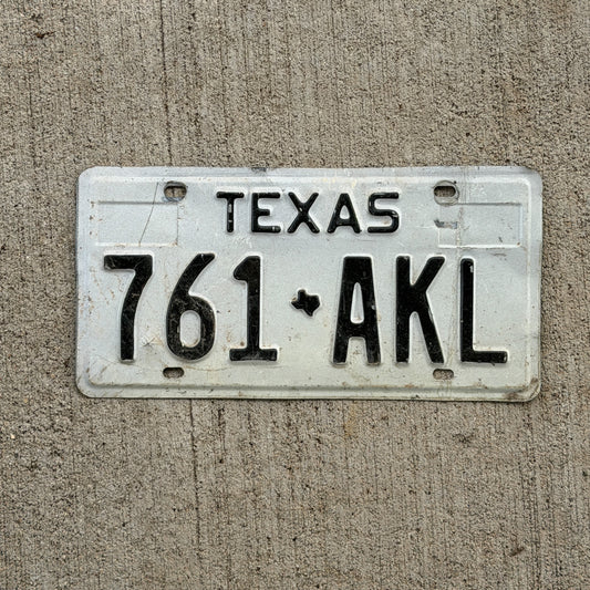 Photo of a 1975 Texas License Plate Auto Tag Garage Decor Vintage 761 AKL with original patina