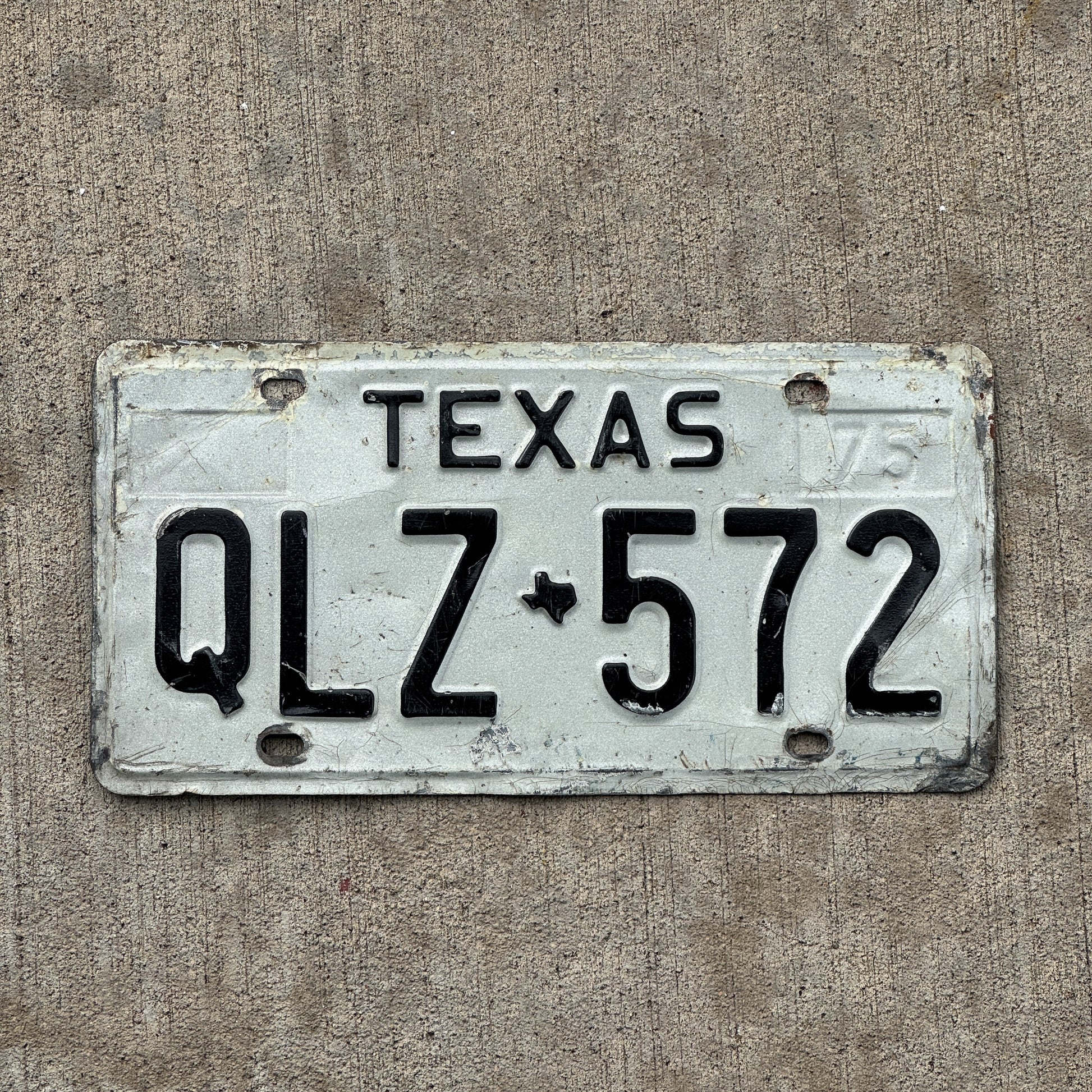 Photo of a 1975 Texas License Plate Auto Tag Garage Decor Vintage QLZ 572 with original patina