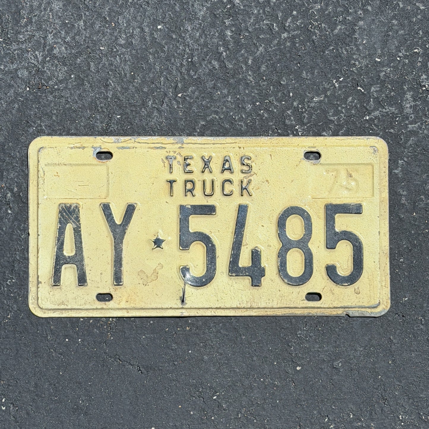 Photo of a 1975 Texas Truck License Plate Auto Tag Garage Decor Vintage AY 5485 with original patina