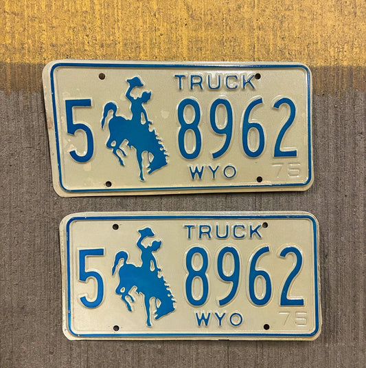 Photo of a 1975 Wyoming Truck License Plate Pair Auto Tag Garage Decor Vintage Cowboy Rodeo 5 8962 with original patina