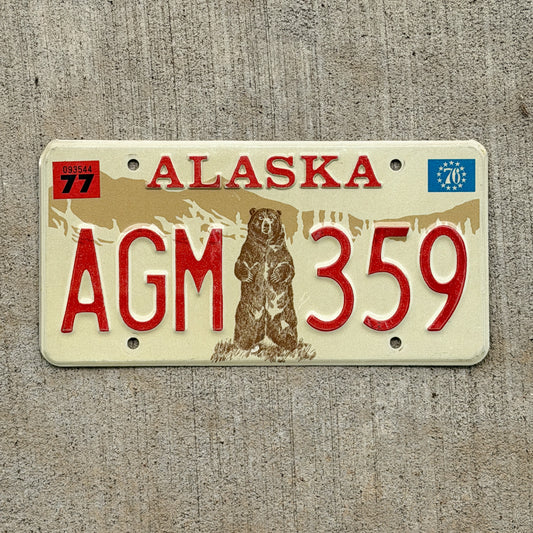 Photo of a 1976 1977 Alaska License Plate Auto Tag 2 Vintage Garage Standing Bear AGM 359 with original patina