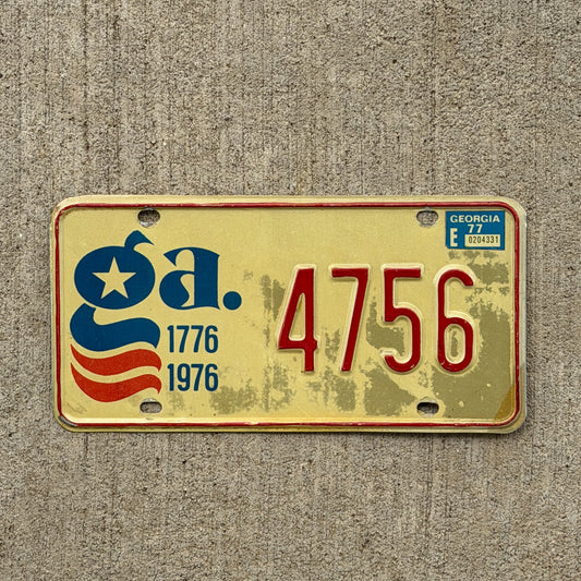 Photo of a 1976 1977 Georgia Graphic / Specialty License Plate Auto Tag Garage Decor Vintage Bicentennial Low Number Four Digit 4756 with original patina