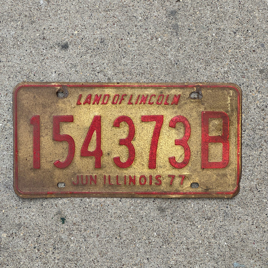 Photo of a 1976 1977 Illinois Truck License Plate Auto Tag Garage Decor Vintage 154 373 B with original patina