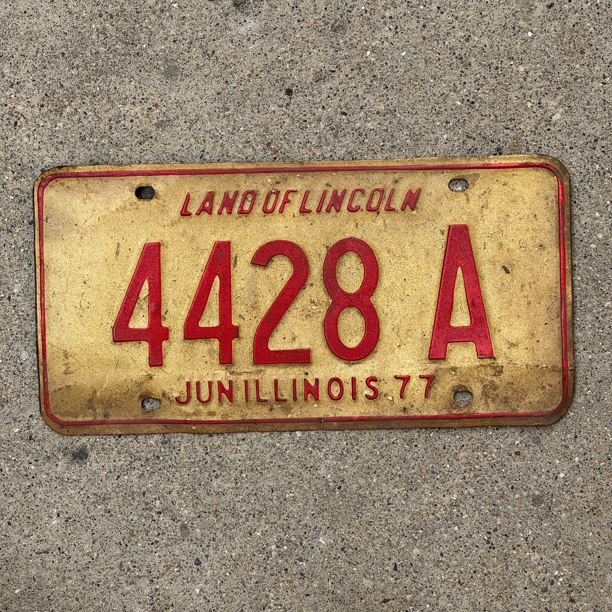 Photo of a 1976 1977 Illinois Truck License Plate Auto Tag Garage Decor Vintage 4428 A with original patina