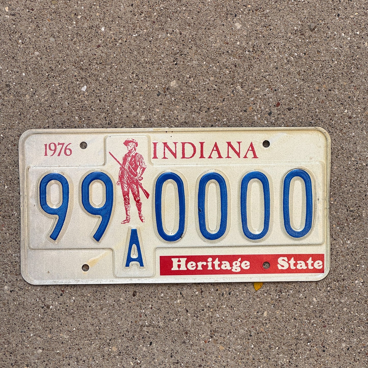 Photo of a 1976 1977 Indiana Sample License Plate Auto Tag 1 Garage Decor 99A0000 with original patina