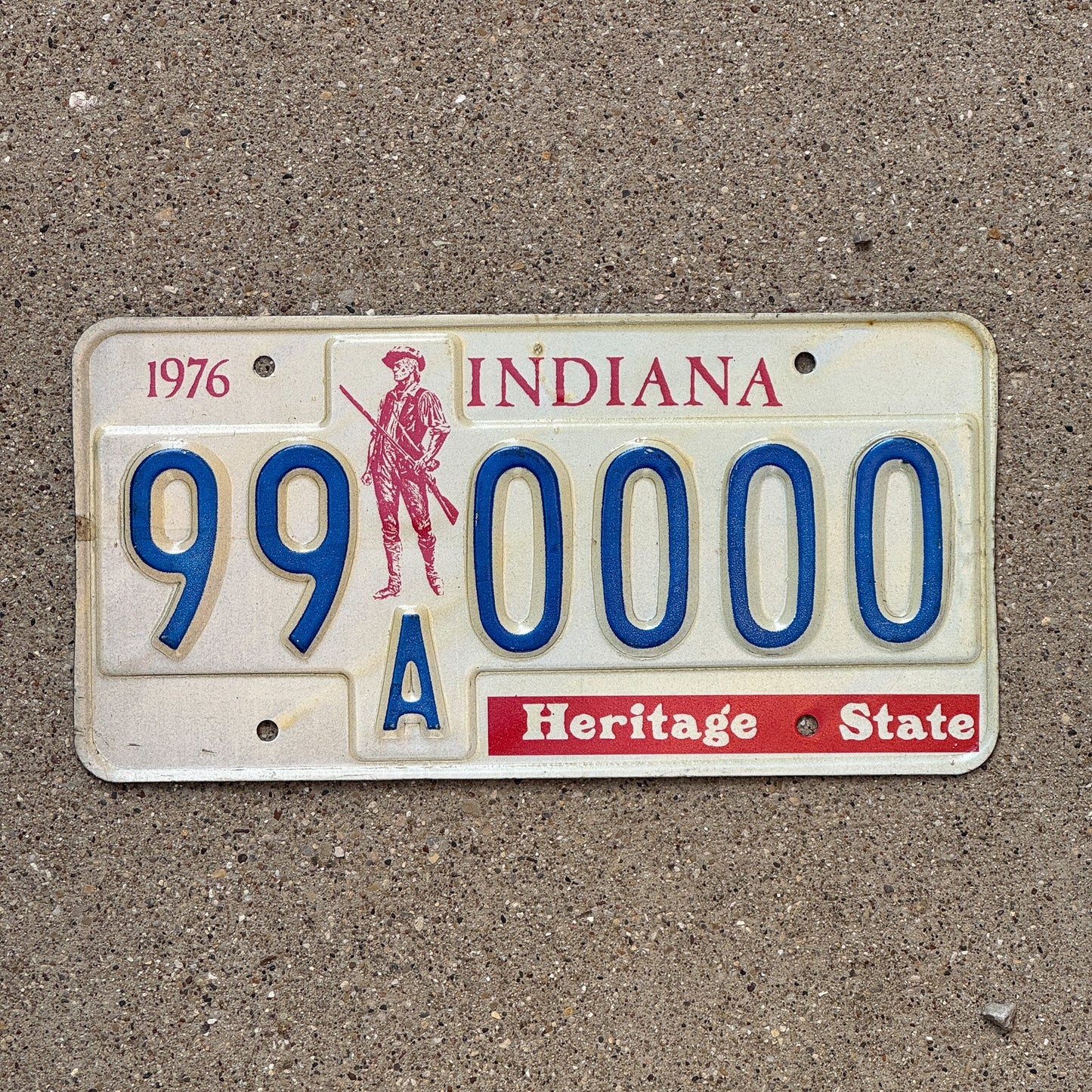 Photo of a 1976 1977 Indiana Sample License Plate Auto Tag 2 Garage Decor 99A0000 with original patina