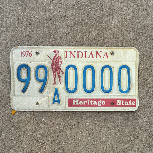 Photo of a 1976 1977 Indiana Sample License Plate Auto Tag 3 Vintage 99A0000 with original patina