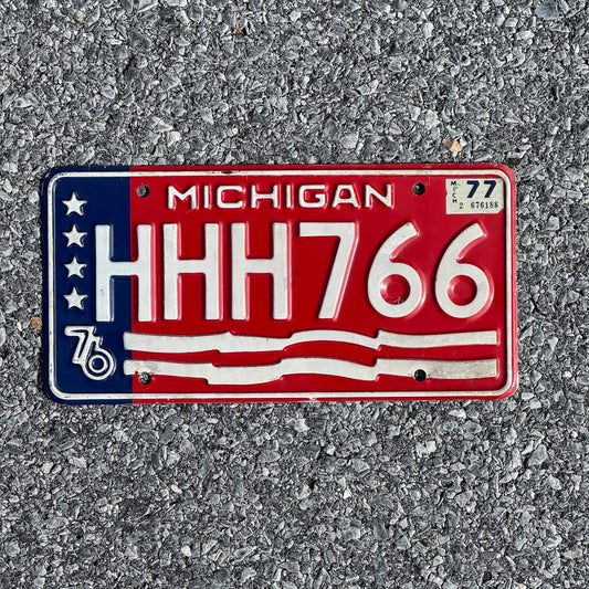 Photo of a 1976 1977 Michigan License Plate Auto Tag Garage Decor Vintage Repeat Repeating HHH 766