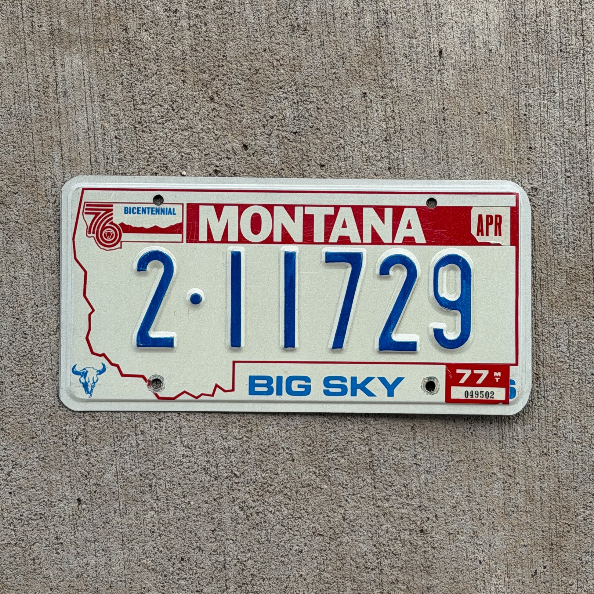 Photo of a 1976 1977 Montana License Plate Auto Tag 1 Vintage Garage Bicentennial 2 11729 with original patina
